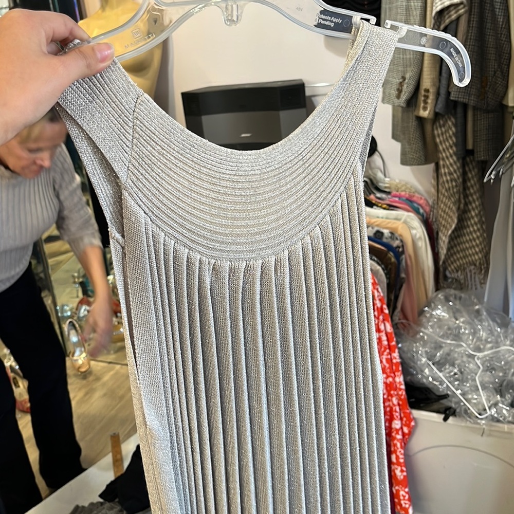 Orange brand . XS but fits S or M . Metallic silver dress
